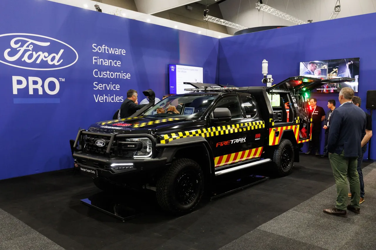 Ford Ranger Super Duty FIRETRAK emergency vehicle at a Ford Pro trade show booth